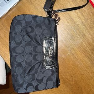 Black Coach wristlet. Awesome used condition!